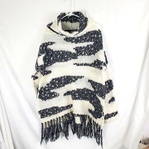 Cut 25 cowlneck sweater with fringe